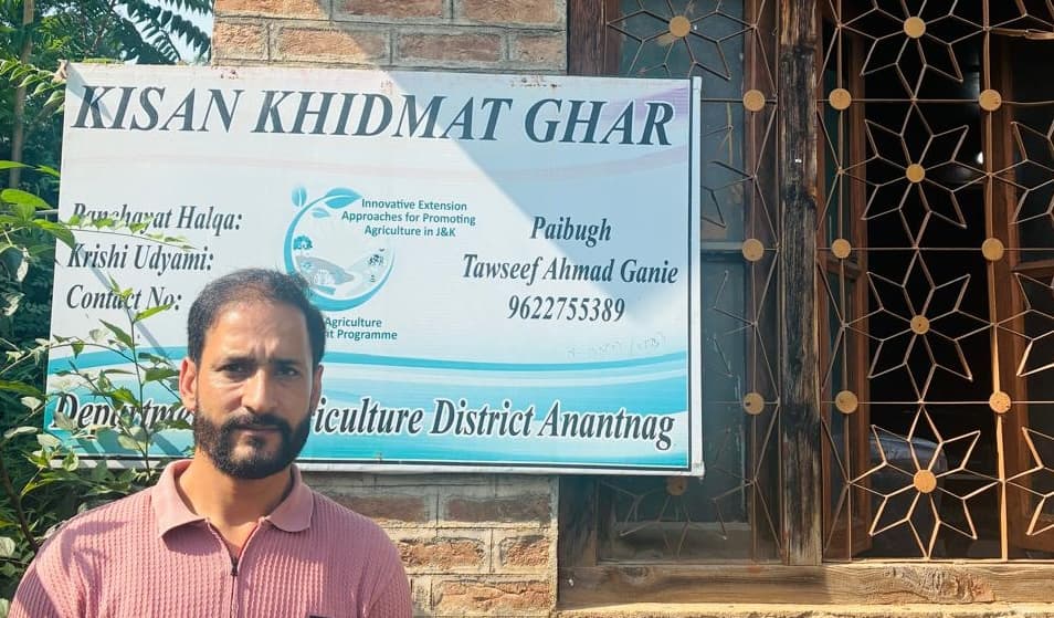 Krishi Udyami Tawseef Ahmad Ganie outside Kisan Khidmat Ghar in Paibugh, Anantnag